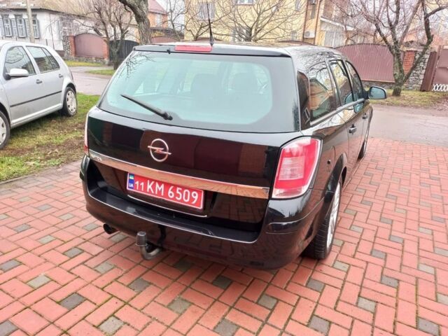 Черный Опель Астра, объемом двигателя 1.8 л и пробегом 200 тыс. км за 5750 $, фото 5 на Automoto.ua
