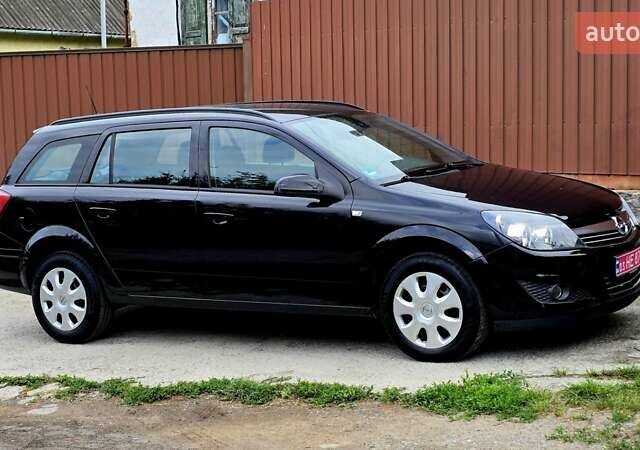 Черный Опель Астра, объемом двигателя 1.6 л и пробегом 238 тыс. км за 6299 $, фото 14 на Automoto.ua