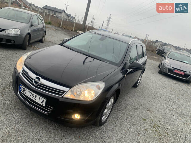 Черный Опель Астра, объемом двигателя 1.6 л и пробегом 232 тыс. км за 5500 $, фото 11 на Automoto.ua