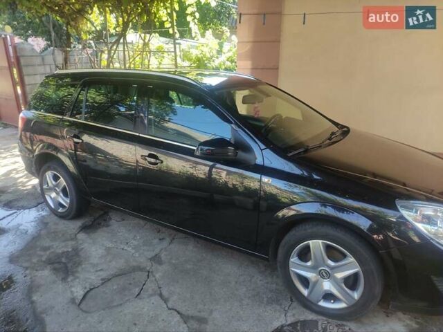 Черный Опель Астра, объемом двигателя 1.6 л и пробегом 205 тыс. км за 5700 $, фото 7 на Automoto.ua