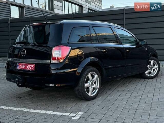 Черный Опель Астра, объемом двигателя 1.6 л и пробегом 160 тыс. км за 6200 $, фото 15 на Automoto.ua