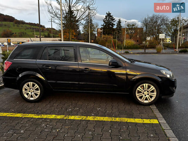 Черный Опель Астра, объемом двигателя 1.69 л и пробегом 268 тыс. км за 8000 $, фото 1 на Automoto.ua