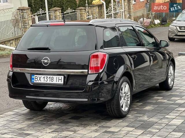 Черный Опель Астра, объемом двигателя 1.6 л и пробегом 199 тыс. км за 6499 $, фото 24 на Automoto.ua