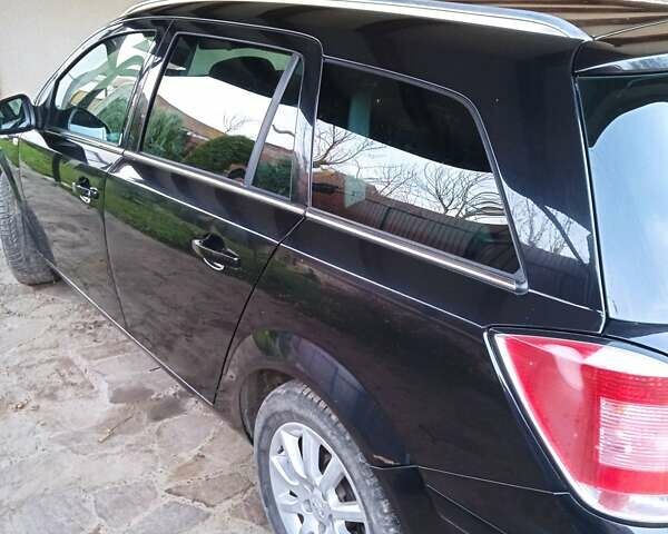 Черный Опель Астра, объемом двигателя 1.6 л и пробегом 168 тыс. км за 5400 $, фото 3 на Automoto.ua