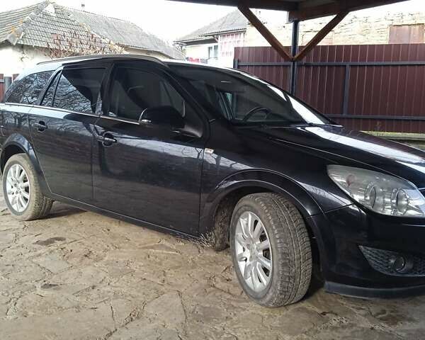 Черный Опель Астра, объемом двигателя 1.6 л и пробегом 168 тыс. км за 5400 $, фото 6 на Automoto.ua