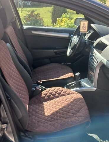 Черный Опель Астра, объемом двигателя 1.8 л и пробегом 164 тыс. км за 5500 $, фото 25 на Automoto.ua
