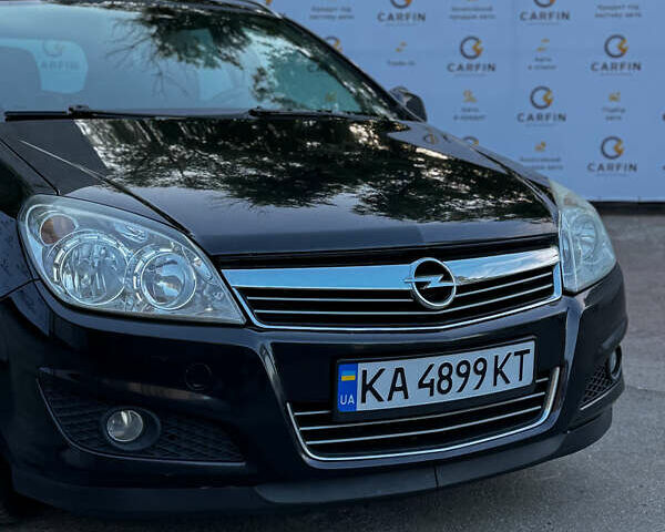 Черный Опель Астра, объемом двигателя 1.7 л и пробегом 251 тыс. км за 5499 $, фото 1 на Automoto.ua