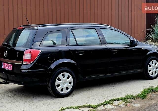 Черный Опель Астра, объемом двигателя 1.6 л и пробегом 238 тыс. км за 6299 $, фото 18 на Automoto.ua