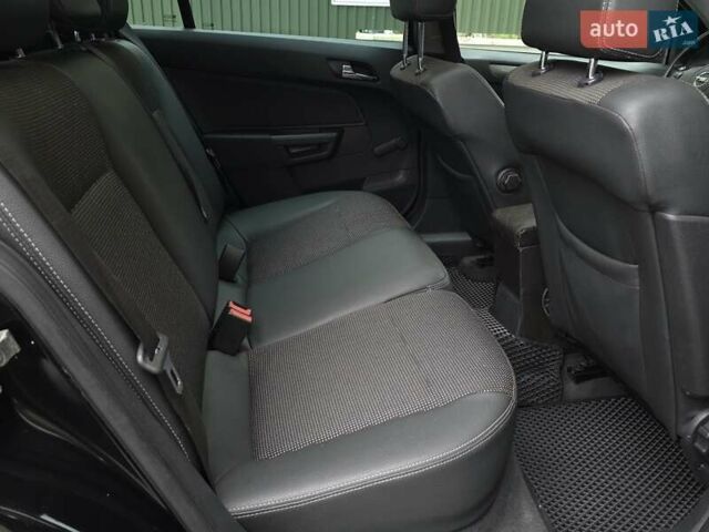 Черный Опель Астра, объемом двигателя 1.7 л и пробегом 224 тыс. км за 5650 $, фото 31 на Automoto.ua