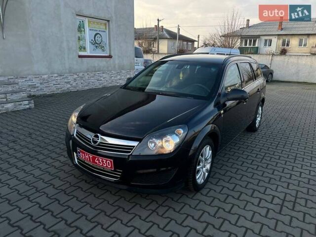 Черный Опель Астра, объемом двигателя 1.6 л и пробегом 219 тыс. км за 5600 $, фото 2 на Automoto.ua