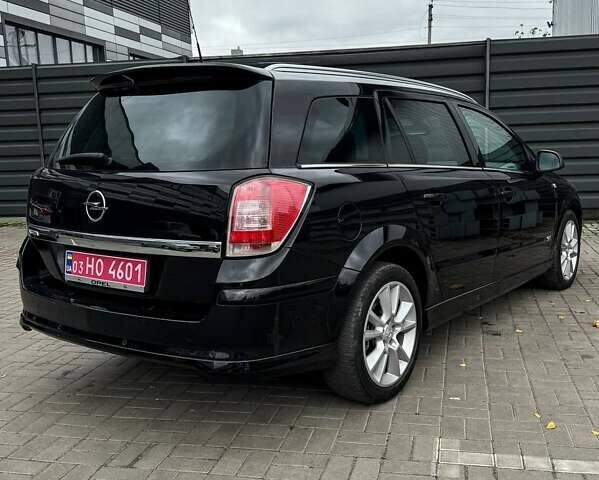 Черный Опель Астра, объемом двигателя 1.6 л и пробегом 152 тыс. км за 7200 $, фото 21 на Automoto.ua