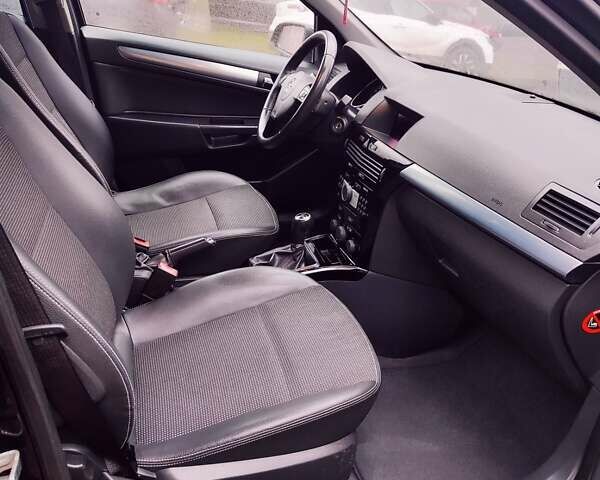 Черный Опель Астра, объемом двигателя 1.6 л и пробегом 212 тыс. км за 5750 $, фото 24 на Automoto.ua
