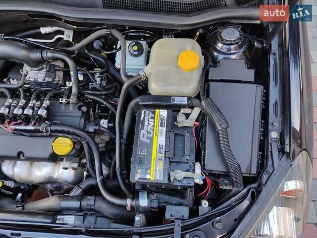 Чорний Опель Астра, об'ємом двигуна 1.4 л та пробігом 215 тис. км за 5900 $, фото 25 на Automoto.ua