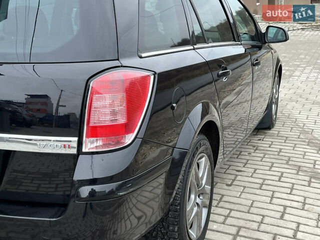 Черный Опель Астра, объемом двигателя 1.7 л и пробегом 264 тыс. км за 5799 $, фото 23 на Automoto.ua