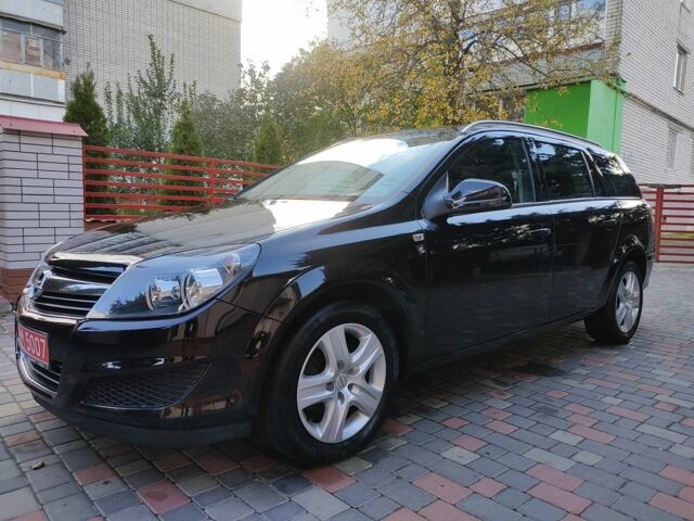 Черный Опель Астра, объемом двигателя 1.4 л и пробегом 215 тыс. км за 5900 $, фото 2 на Automoto.ua