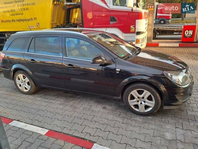 Черный Опель Астра, объемом двигателя 1.6 л и пробегом 209 тыс. км за 5100 $, фото 8 на Automoto.ua