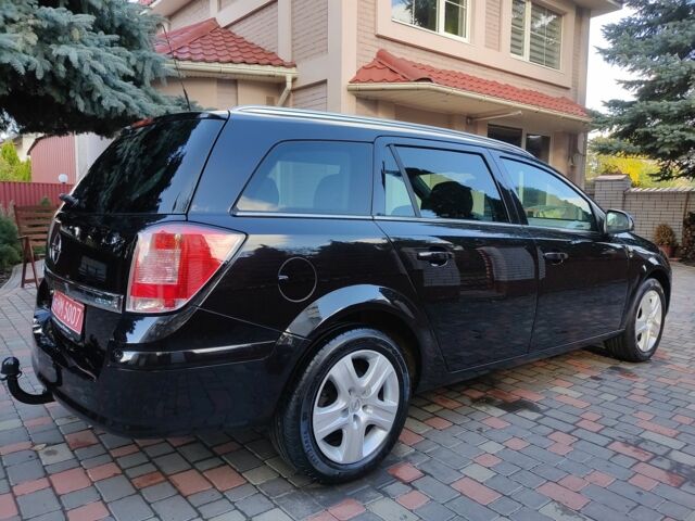 Черный Опель Астра, объемом двигателя 1.4 л и пробегом 215 тыс. км за 5900 $, фото 4 на Automoto.ua