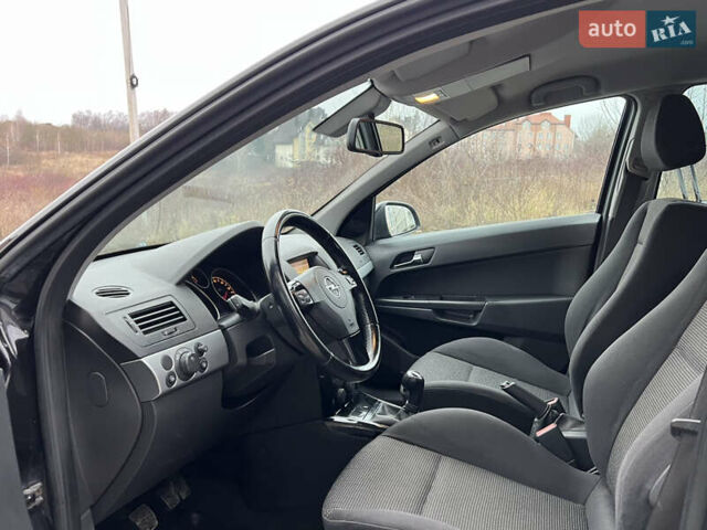 Черный Опель Астра, объемом двигателя 1.7 л и пробегом 264 тыс. км за 5799 $, фото 38 на Automoto.ua