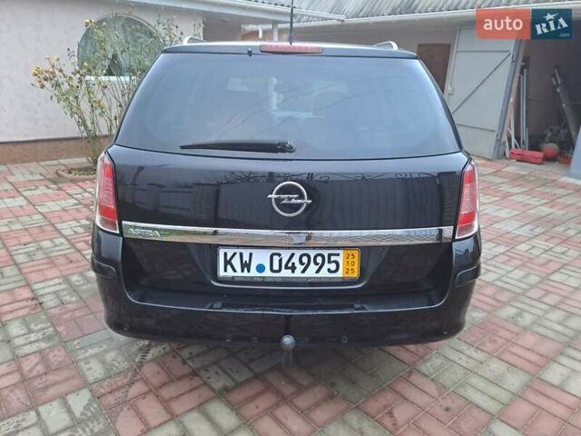 Черный Опель Астра, объемом двигателя 1.6 л и пробегом 209 тыс. км за 5800 $, фото 9 на Automoto.ua