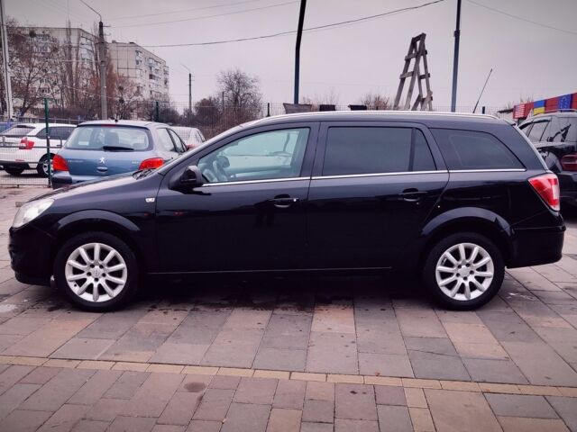 Черный Опель Астра, объемом двигателя 1.6 л и пробегом 237 тыс. км за 5350 $, фото 4 на Automoto.ua