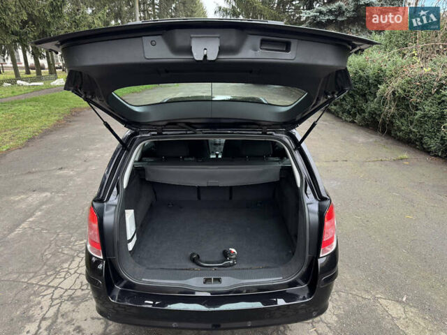 Черный Опель Астра, объемом двигателя 1.6 л и пробегом 228 тыс. км за 5750 $, фото 17 на Automoto.ua