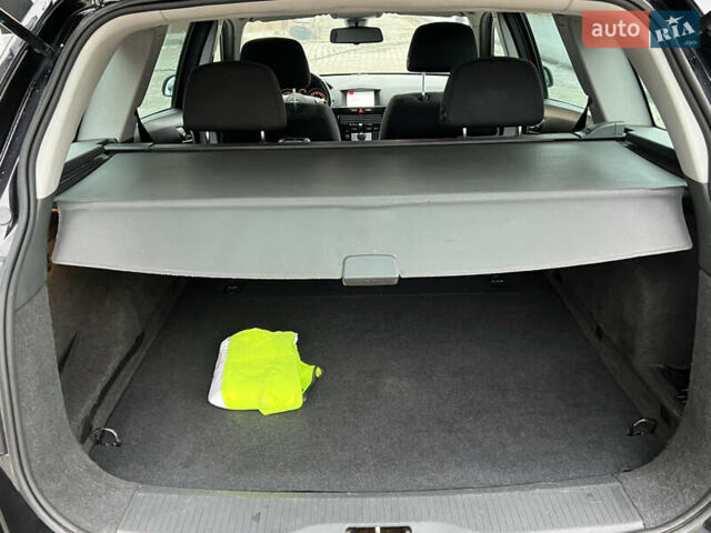 Черный Опель Астра, объемом двигателя 1.7 л и пробегом 264 тыс. км за 5799 $, фото 49 на Automoto.ua