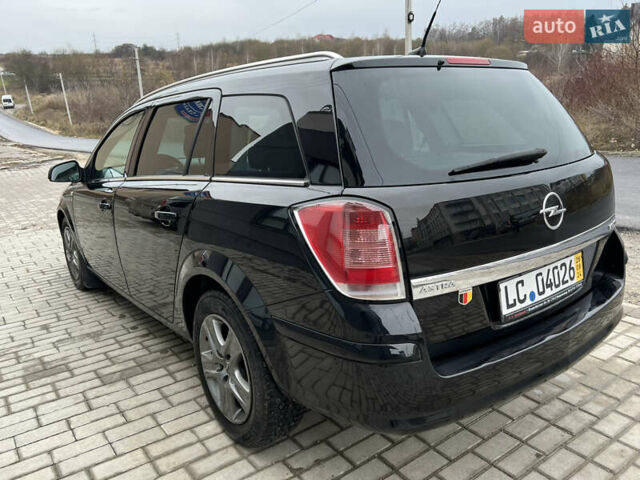 Черный Опель Астра, объемом двигателя 1.7 л и пробегом 264 тыс. км за 5799 $, фото 17 на Automoto.ua