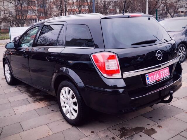 Черный Опель Астра, объемом двигателя 1.6 л и пробегом 237 тыс. км за 5350 $, фото 7 на Automoto.ua