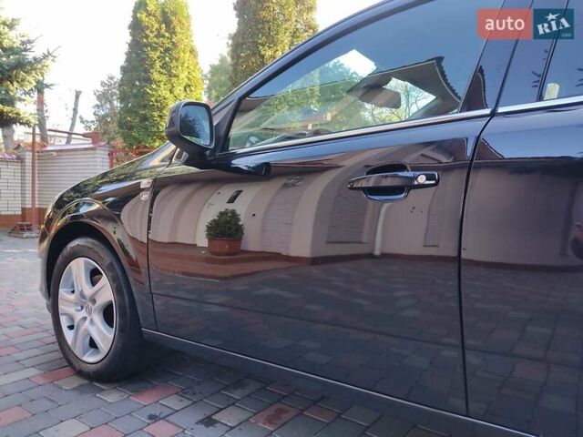 Чорний Опель Астра, об'ємом двигуна 1.4 л та пробігом 215 тис. км за 5900 $, фото 6 на Automoto.ua