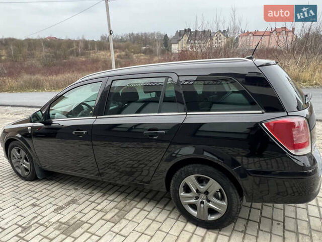 Черный Опель Астра, объемом двигателя 1.7 л и пробегом 264 тыс. км за 5799 $, фото 16 на Automoto.ua