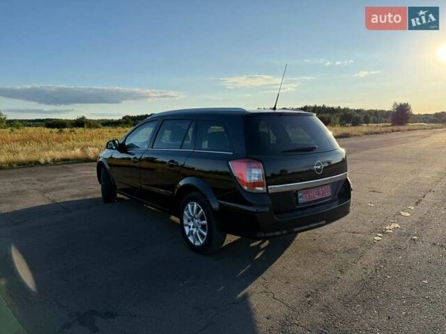 Черный Опель Астра, объемом двигателя 1.6 л и пробегом 175 тыс. км за 6300 $, фото 3 на Automoto.ua