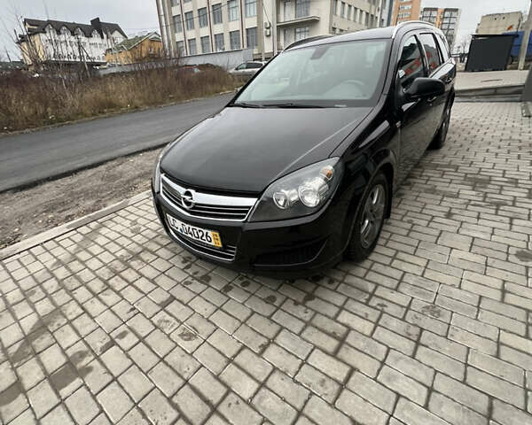 Черный Опель Астра, объемом двигателя 1.7 л и пробегом 264 тыс. км за 5799 $, фото 57 на Automoto.ua