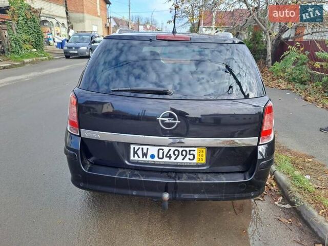 Черный Опель Астра, объемом двигателя 1.6 л и пробегом 209 тыс. км за 5100 $, фото 3 на Automoto.ua