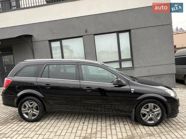 Черный Опель Астра, объемом двигателя 1.7 л и пробегом 264 тыс. км за 5799 $, фото 27 на Automoto.ua