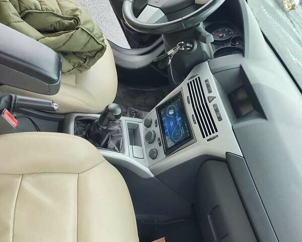 Черный Опель Астра, объемом двигателя 1.7 л и пробегом 300 тыс. км за 4500 $, фото 4 на Automoto.ua