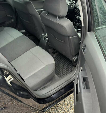 Черный Опель Астра, объемом двигателя 1.69 л и пробегом 242 тыс. км за 6200 $, фото 17 на Automoto.ua