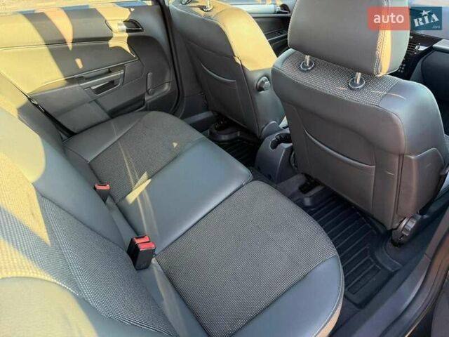 Черный Опель Астра, объемом двигателя 1.6 л и пробегом 175 тыс. км за 6300 $, фото 4 на Automoto.ua