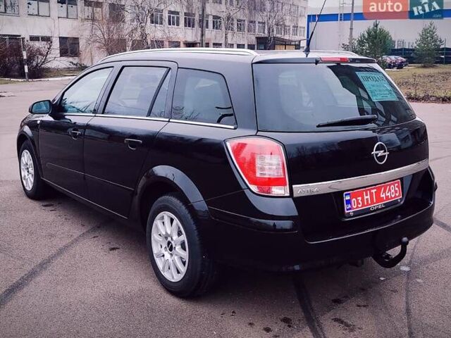 Черный Опель Астра, объемом двигателя 1.6 л и пробегом 172 тыс. км за 5350 $, фото 7 на Automoto.ua