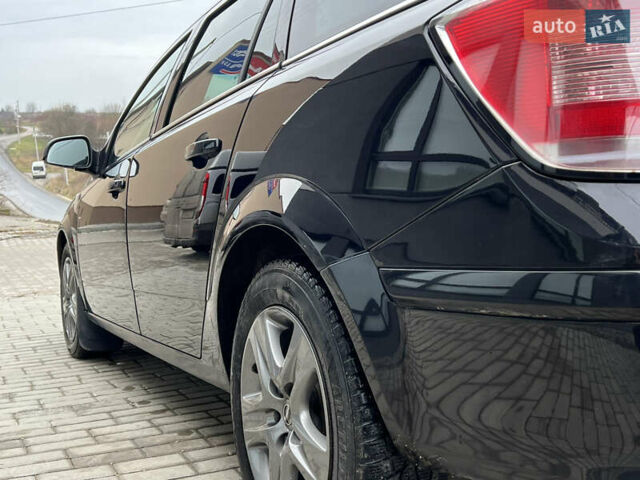 Черный Опель Астра, объемом двигателя 1.7 л и пробегом 264 тыс. км за 5799 $, фото 18 на Automoto.ua