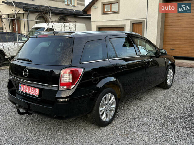 Черный Опель Астра, объемом двигателя 1.6 л и пробегом 252 тыс. км за 6400 $, фото 13 на Automoto.ua