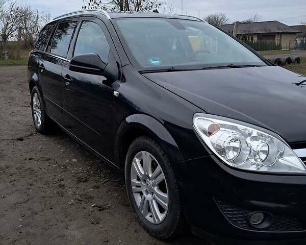 Черный Опель Астра, объемом двигателя 1.6 л и пробегом 216 тыс. км за 6200 $, фото 1 на Automoto.ua