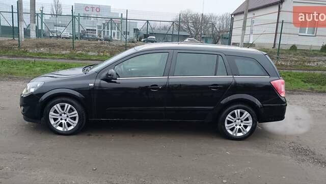 Черный Опель Астра, объемом двигателя 1.69 л и пробегом 246 тыс. км за 6500 $, фото 2 на Automoto.ua