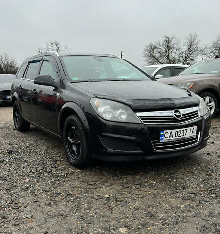Черный Опель Астра, объемом двигателя 1.69 л и пробегом 242 тыс. км за 6200 $, фото 10 на Automoto.ua