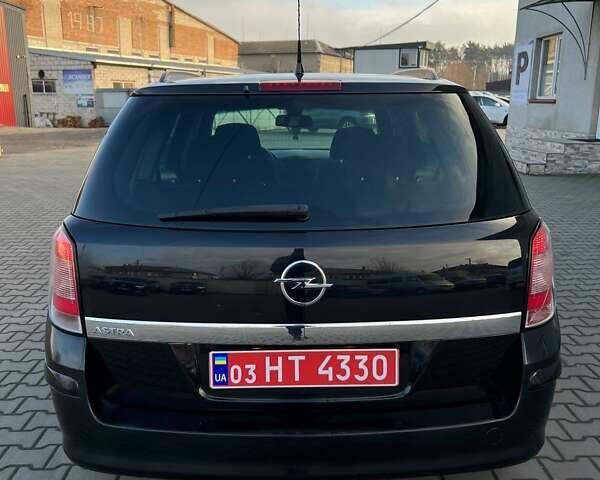 Черный Опель Астра, объемом двигателя 1.6 л и пробегом 219 тыс. км за 5600 $, фото 3 на Automoto.ua
