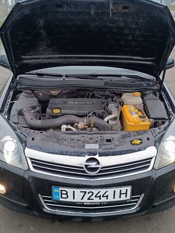 Черный Опель Астра, объемом двигателя 1.69 л и пробегом 246 тыс. км за 6500 $, фото 9 на Automoto.ua