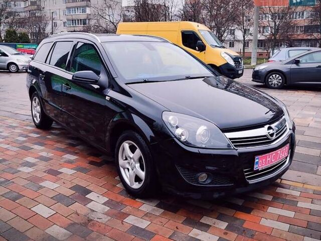 Черный Опель Астра, объемом двигателя 1.6 л и пробегом 212 тыс. км за 5750 $, фото 4 на Automoto.ua