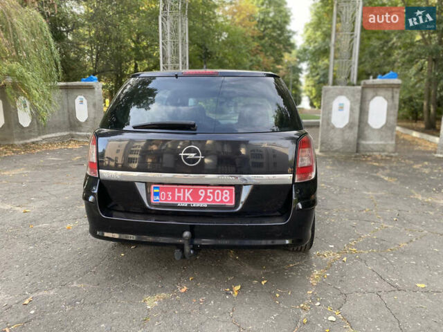 Черный Опель Астра, объемом двигателя 1.6 л и пробегом 200 тыс. км за 6400 $, фото 9 на Automoto.ua