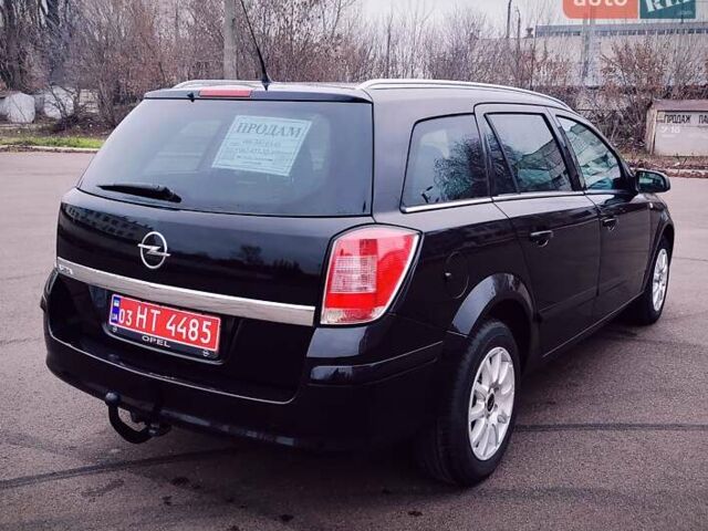 Черный Опель Астра, объемом двигателя 1.6 л и пробегом 172 тыс. км за 5350 $, фото 5 на Automoto.ua