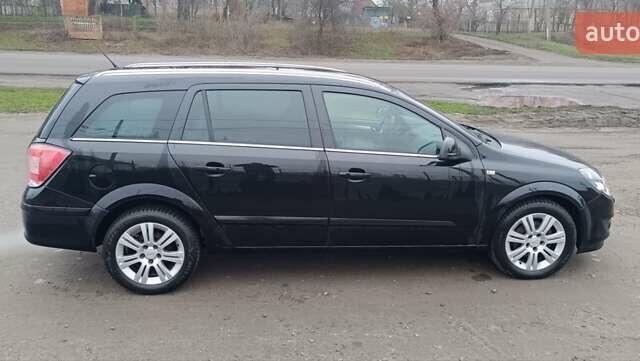 Черный Опель Астра, объемом двигателя 1.69 л и пробегом 246 тыс. км за 6500 $, фото 3 на Automoto.ua