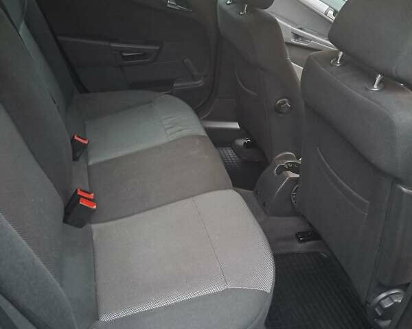 Черный Опель Астра, объемом двигателя 1.6 л и пробегом 209 тыс. км за 5800 $, фото 10 на Automoto.ua